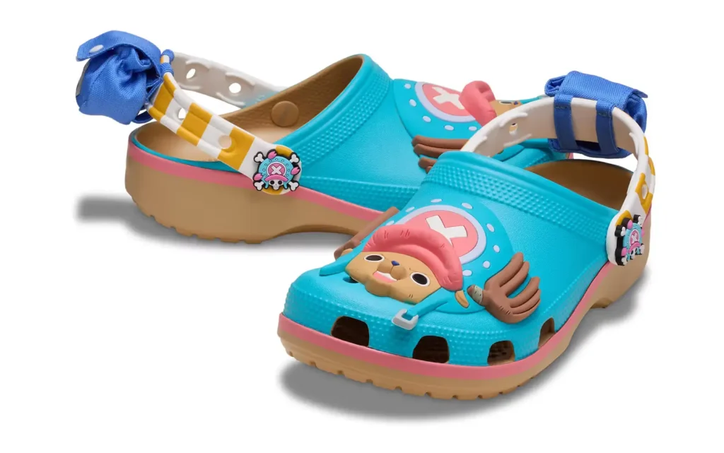 E PIECE x Crocs Classic Clog inspired by Tony Tony Chopper featuring turquoise Croslite foam upper, character face graphic, and themed pirate Jibbitz charms