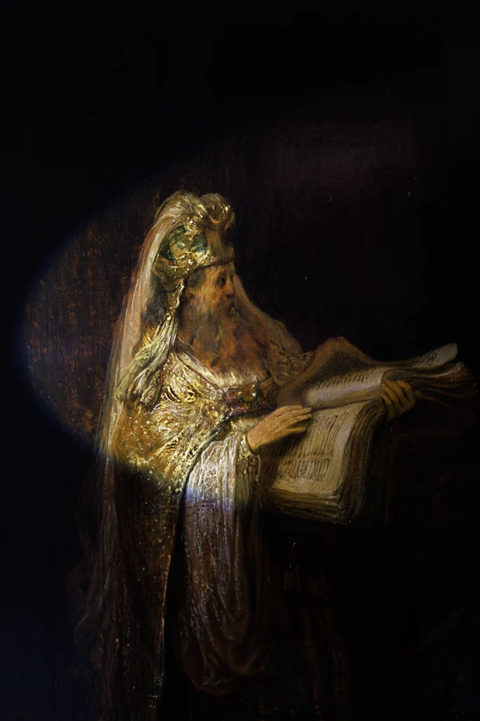 This close-up captures the upper half of Zacharias as rendered by Rembrandt van Rijn in Vision of Zacharias in the Temple (1633), now authenticated and displayed at the Rijksmuseum