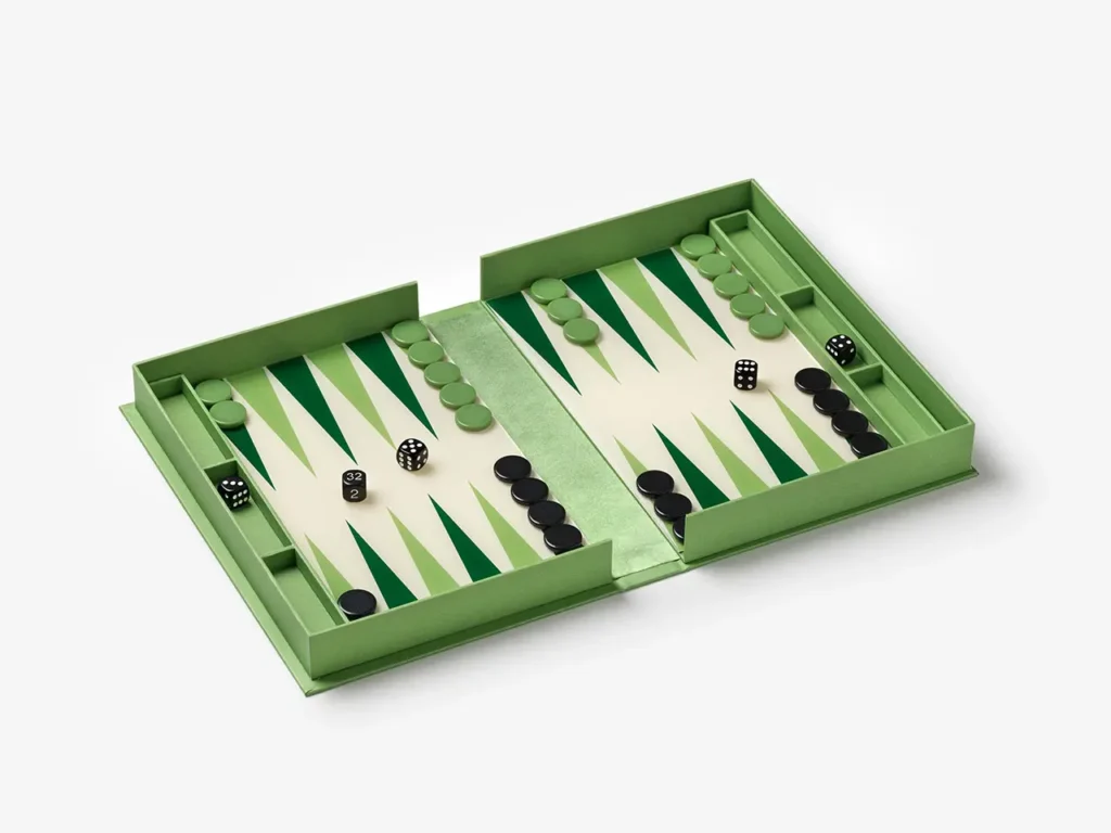 Open PRINTWORKS × Rosewood backgammon board with green and cream design, game pieces, and dice