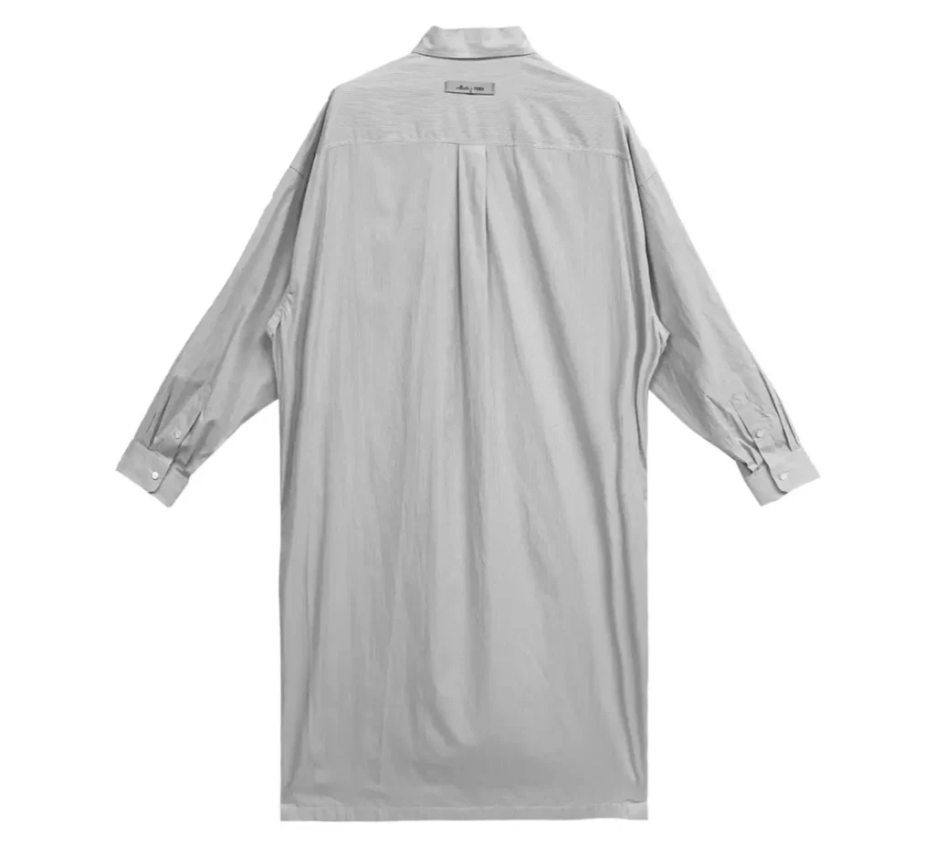 Back view of the Fendi silver oversized button-down shirt featuring a relaxed long silhouette with back pleat detail and minimalist design