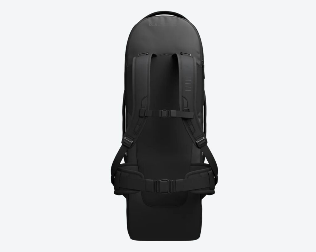 Rear view of the Db Journey Skate Duffel 65L showing padded backpack straps, chest and waist support straps, and ergonomic carrying system for comfortable travel mobility