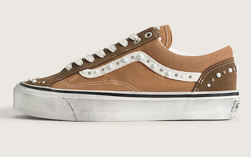 Vans Old Skool Pearlised shoe featuring tan canvas upper, suede overlays, and pearl embellishments along the iconic Vans Sidestripe