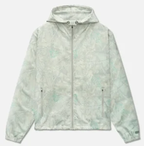 Front view of Inverness Spray Green x Antique White hooded anorak with camo-style pattern and zip pockets
