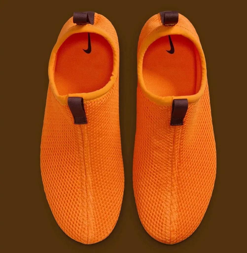Nike Rejuven8 Run Retro orange mesh inner booties with pull tabs and Nike logo footbed