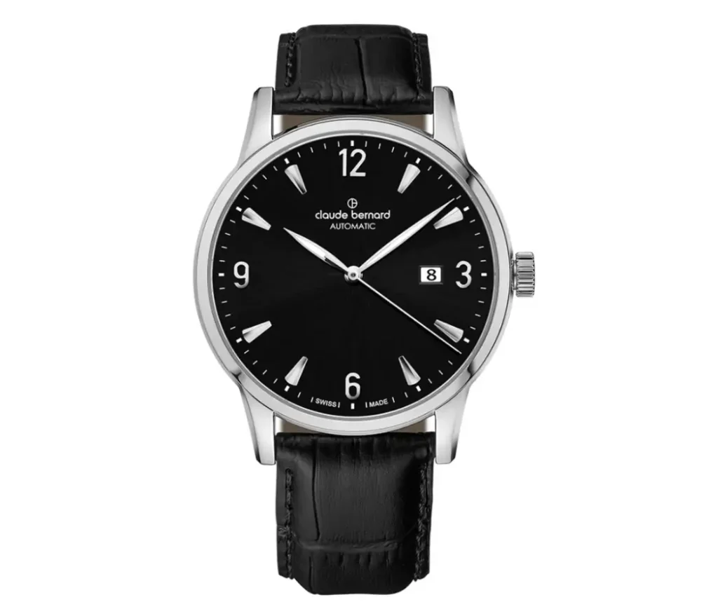 Front view of the Claude Bernard Classic Automatic Date watch featuring a black dial, silver-tone hour markers, stainless steel case, and black leather strap