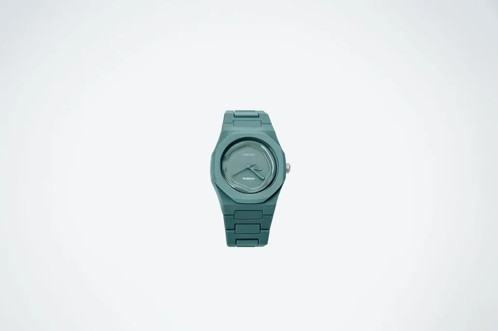 Tonester D1 Milano matte ceramic wristwatch in teal green with a monochrome dial and integrated bracelet, shown against a clean white background