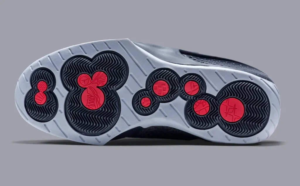 Air Jordan 20 “Stealth” (2015) outsole featuring Independent Podular Suspension cushioning with circular traction pods in black, grey, and red