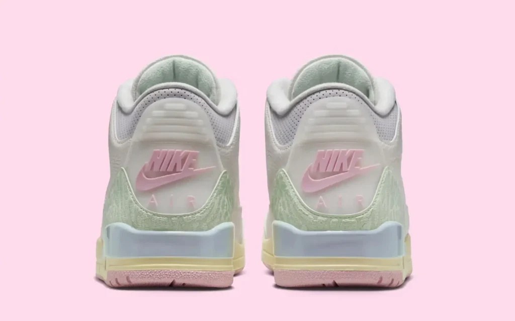 Outsole of Air Jordan 3 OG “Spring Is in the Air” featuring pink rubber, green traction circle, and Nike branding
