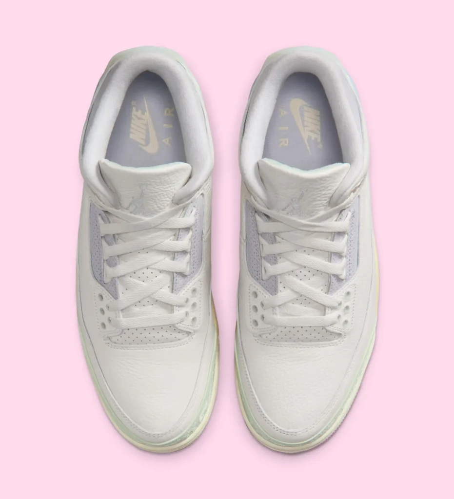 Top-down view of Air Jordan 3 OG “Spring Is in the Air” pair in soft pastel tones with white leather and subtle green accents