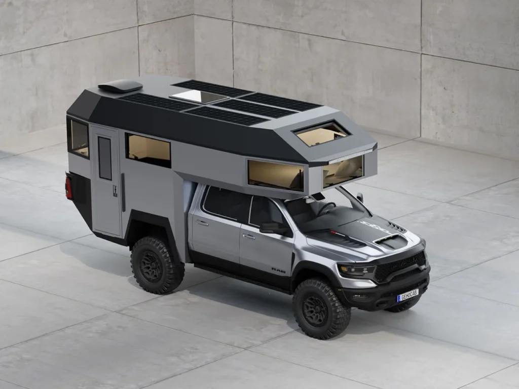 GEHOcab EDGE Explorer Trail truck camper on RAM pickup with solar roof panels and angular brutalist design