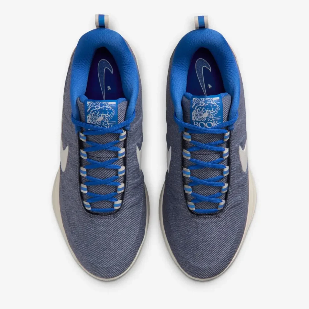 Top view of the Nike Book 2 “Must Be The Denim” shoes showing denim-textured uppers and blue lace system with Booker tongue logo