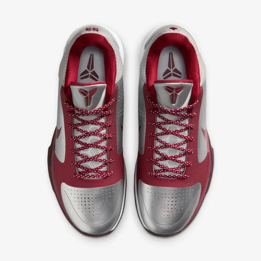 Side profile of the Nike Kobe 5 Protro “Lower Merion Aces” in metallic silver, white, and team red with red Swoosh honoring Kobe Bryant
