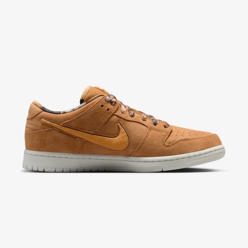NOTE x Nike SB Dunk Low “Brew & Biscuits” in biscuit-toned suede with tonal Swoosh, patterned laces, and off-white midsole, shown in lateral side profile highlighting layered textures and warm coffee-inspired color palette