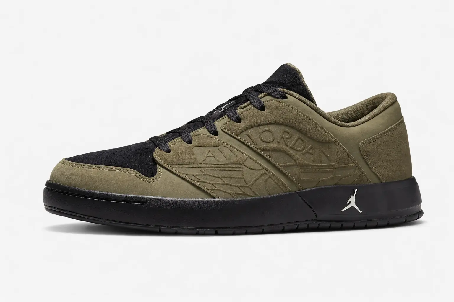 Air Jordan low-top shoe in olive and black, featuring a suede and leather upper with black toe panels, olive overlays, tonal laces, embossed oversized Wings logo on the lateral side, and a sleek black midsole with subtle Jumpman branding