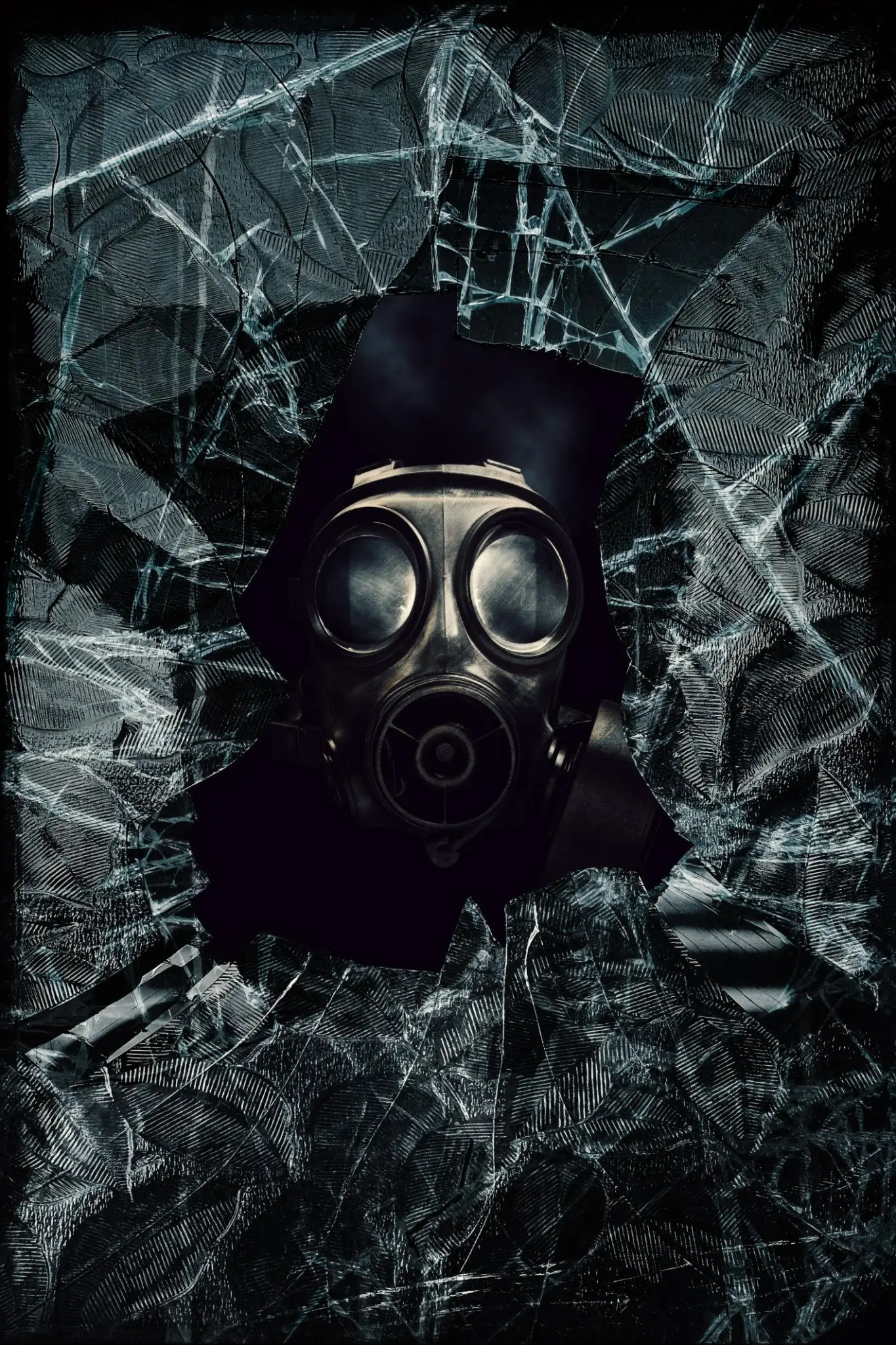 A haunting, high-contrast image centers on a figure wearing a vintage-style gas mask, emerging from deep silhouette. The mask’s round glass lenses reflect faint light, giving it an eerie, almost lifeless gaze. Surrounding the figure is a jagged frame of shattered glass, its cracks spiderwebbing outward in sharp, chaotic lines. The broken shards catch highlights, creating a fractured, crystalline texture that contrasts with the darkness behind. The composition feels tense and claustrophobic—suggesting danger, contamination, or a post-apocalyptic environment where survival depends on isolation and protection