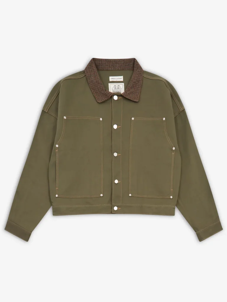 Front view of Estudio Niksen Carpenter Collar Jacket in khaki with a relaxed boxy silhouette, contrast stitching, large front patch pockets with rivet details, button-up closure, and textured checkered collar
