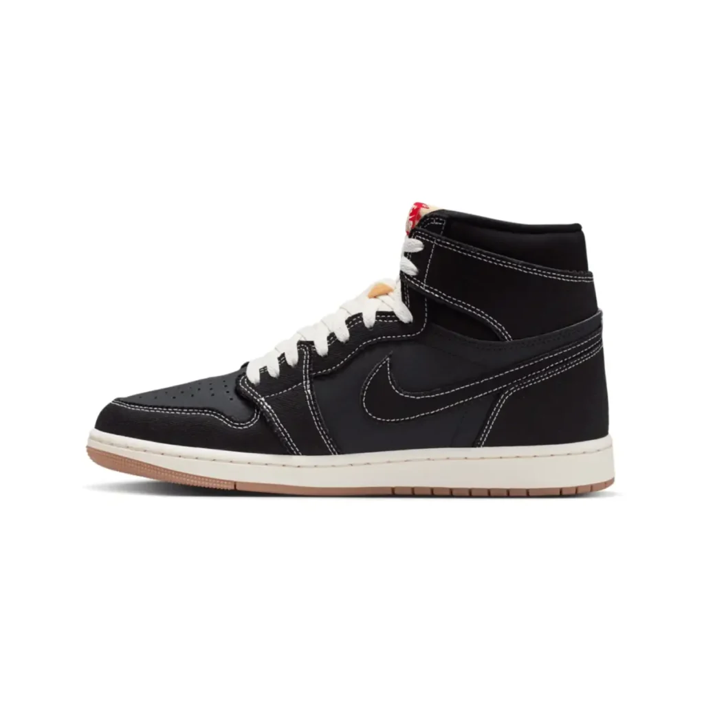 Reverse side profile of the Air Jordan 1 High OG “Flight Club” (2026) in black leather with contrast white stitching, white laces, exposed foam tongue detail, Sail midsole, and gum outsole on a clean studio background