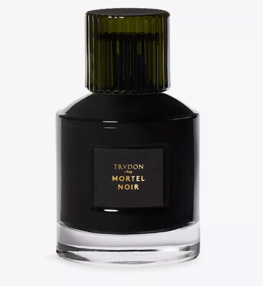 Trudon Mortel Noir Parfum bottle in deep black glass with a ribbed dark green cap, featuring a minimalist label with gold typography, set on a clean neutral background