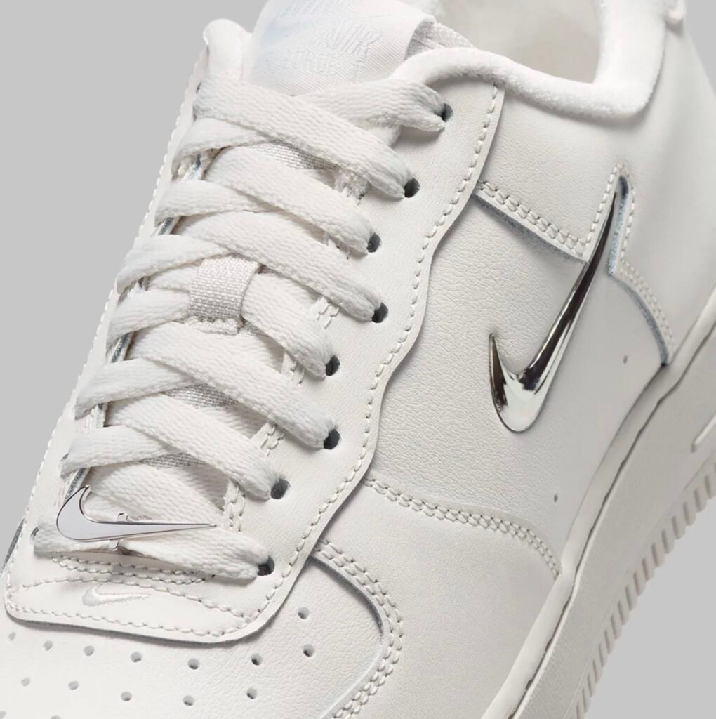 Women’s Nike Air Force 1 Low IU7558-030 Phantom with metallic silver Swoosh in detailed close-up