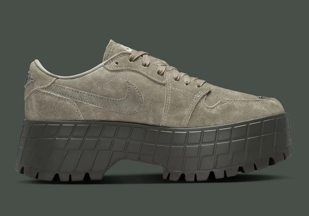 Side profile of the Air Jordan 1 Low Brooklyn “Cargo Khaki” featuring a full suede upper in muted khaki tones, tonal stitched Swoosh, matching laces, and a bold dark olive platform sole with grid-patterned sidewalls and deep lug outsole for a rugged, elevated look