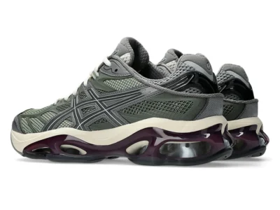 Pair of ASICS GEL-Kinetic 2.0 ‘Lichen Green’ shoe shown from a front three-quarter angle. The premium Sportstyle model features a detailed lichen green mesh and synthetic upper with bold ASICS Tiger stripes, off-white midsole, and a striking translucent dark burgundy GEL cushioning unit with visible silver scutoid GEL pods