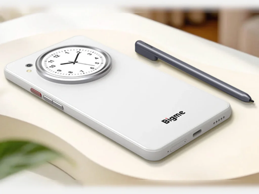 BIGME HIBREAK DUAL e-Ink device in white finish with circular rear LCD clock display and stylus placed beside it on a minimal desk surface