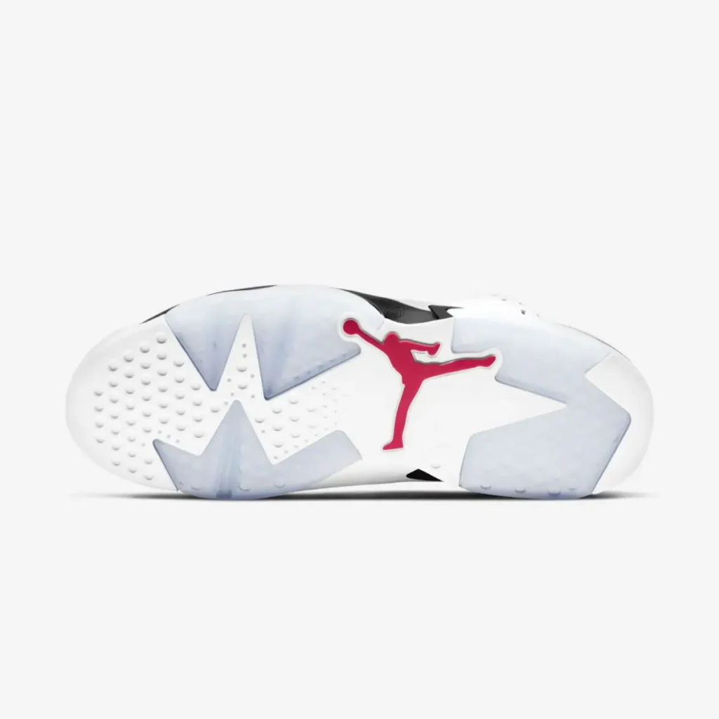 Outsole view of the Air Jordan 6 “Carmine” featuring a white rubber base with translucent icy blue sections and a red Jumpman logo at the center