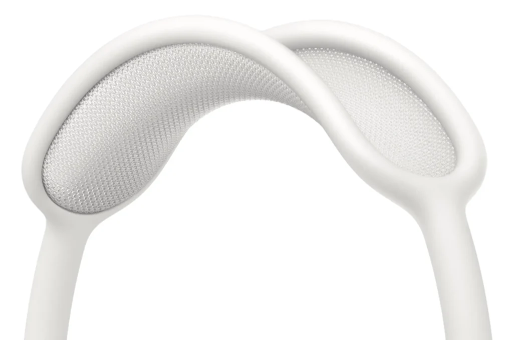 Close-up of Apple AirPods Max 2 mesh headband in light finish, showing breathable knit canopy and ergonomic support design