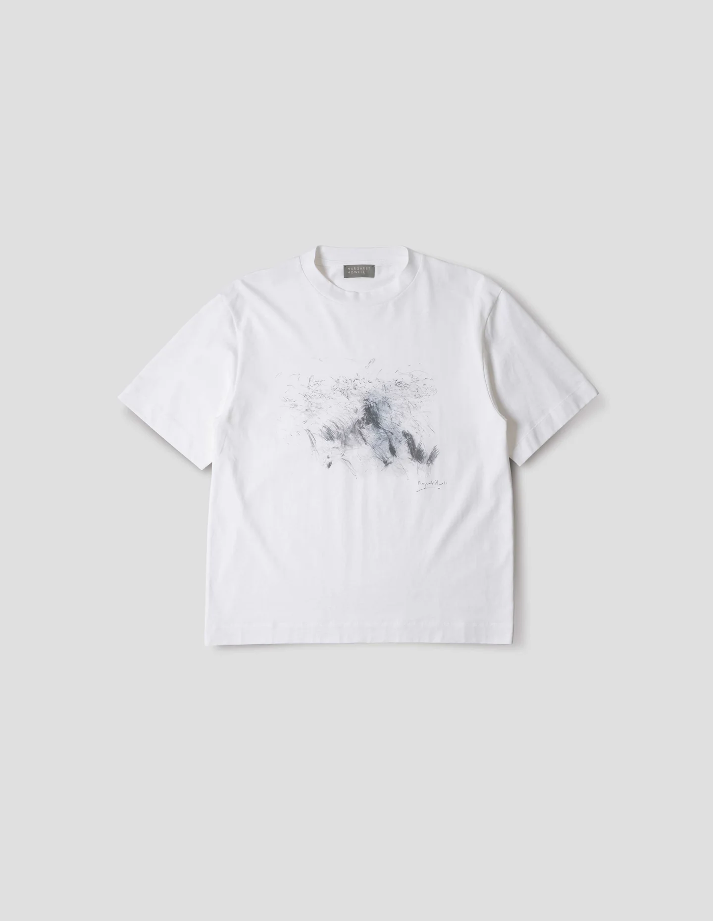 White Margaret Howell T-shirt with abstract grass sketch print.