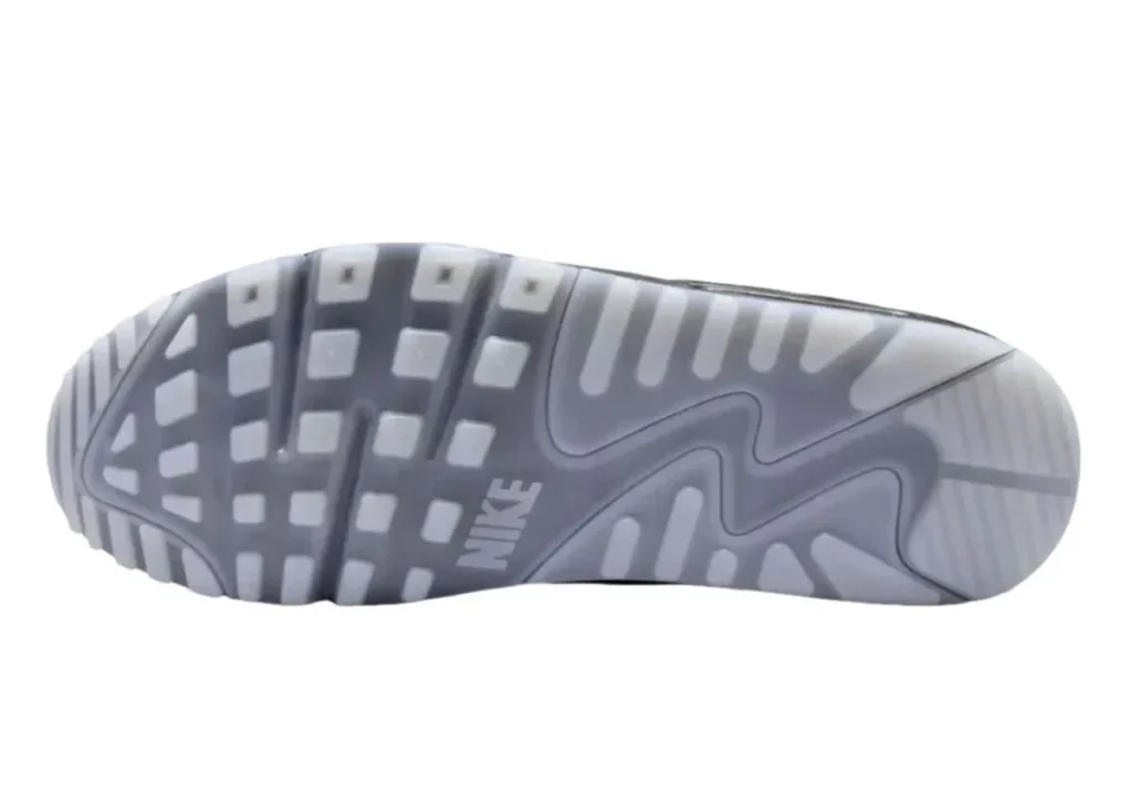 Outsole view of Nike Air Max 90 “Korea” featuring a semi-translucent grey rubber sole with classic waffle traction pattern and visible Nike branding at the midfoot