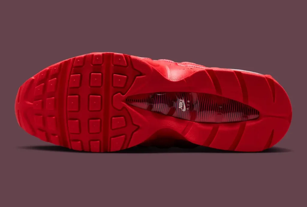 Outsole view of Nike Air Max 95 Total 90 “University Red” featuring all-red rubber traction pattern with visible midfoot shank and Nike Air branding detail