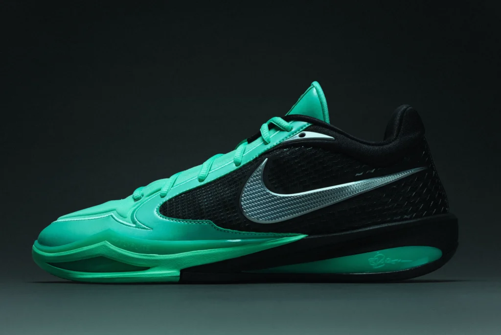 Nike Sabrina 4 low-top basketball shoe in teal and black with textured mesh upper, metallic silver Swoosh, and streamlined midsole built for responsive movement and court stability
