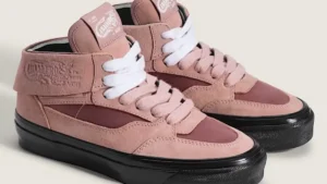 Vans Half Cab Steve Caballero shoe in dusty pink suede with white laces and black sole, shown in a clean studio setting
