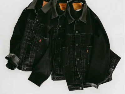 ÉDIFICE x Levi’s 2nd Type Tracker Jacket Reserve displayed alongside a matching black denim variation, highlighting the collaboration’s minimalist aesthetic and premium construction