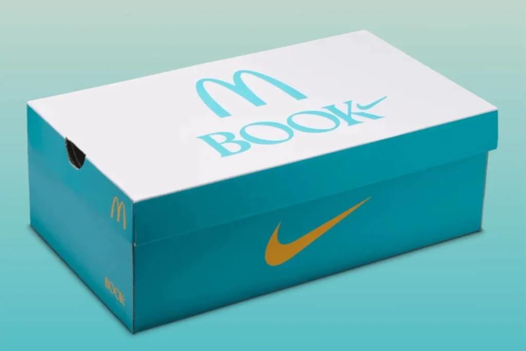 Co-branded McDonald’s x Nike Book 2 special edition shoebox in turquoise and white featuring Nike and Book graphics with playful fast-food-inspired packaging design