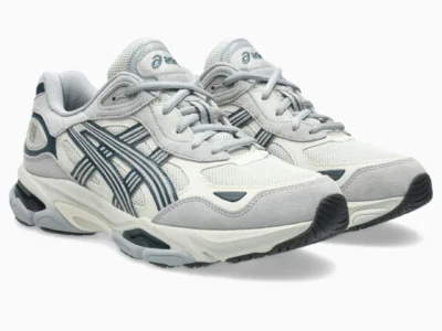 Pair of ASICS GEL-NYC 2.0 “Lake Grey/Piedmont Grey” sneakers showcasing breathable mesh construction, premium suede panels, and retro-inspired running aesthetic