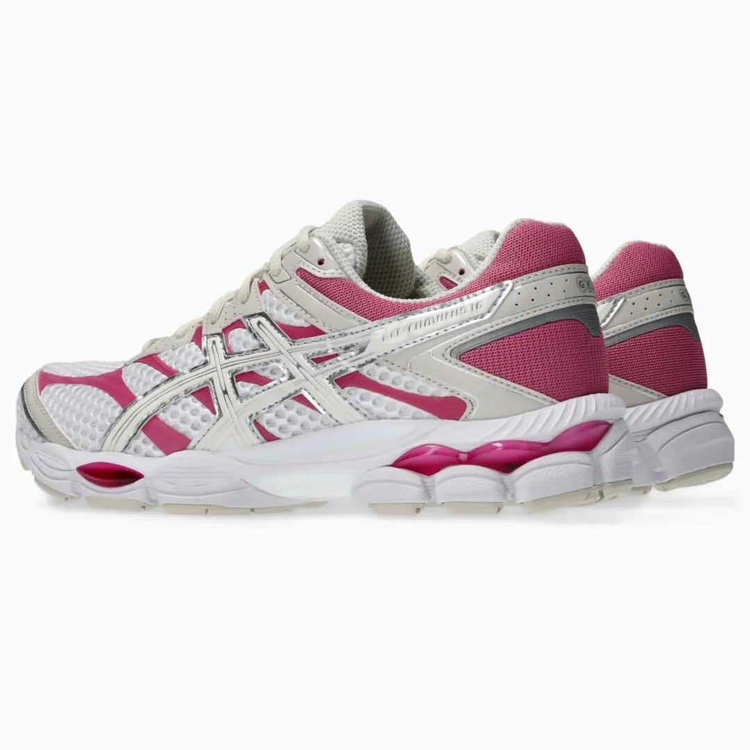 Rear angled product image of the ASICS GEL-CUMULUS 16 emphasizing the pink heel mesh, cream heel cage, sculpted midsole, and visible GEL cushioning pods