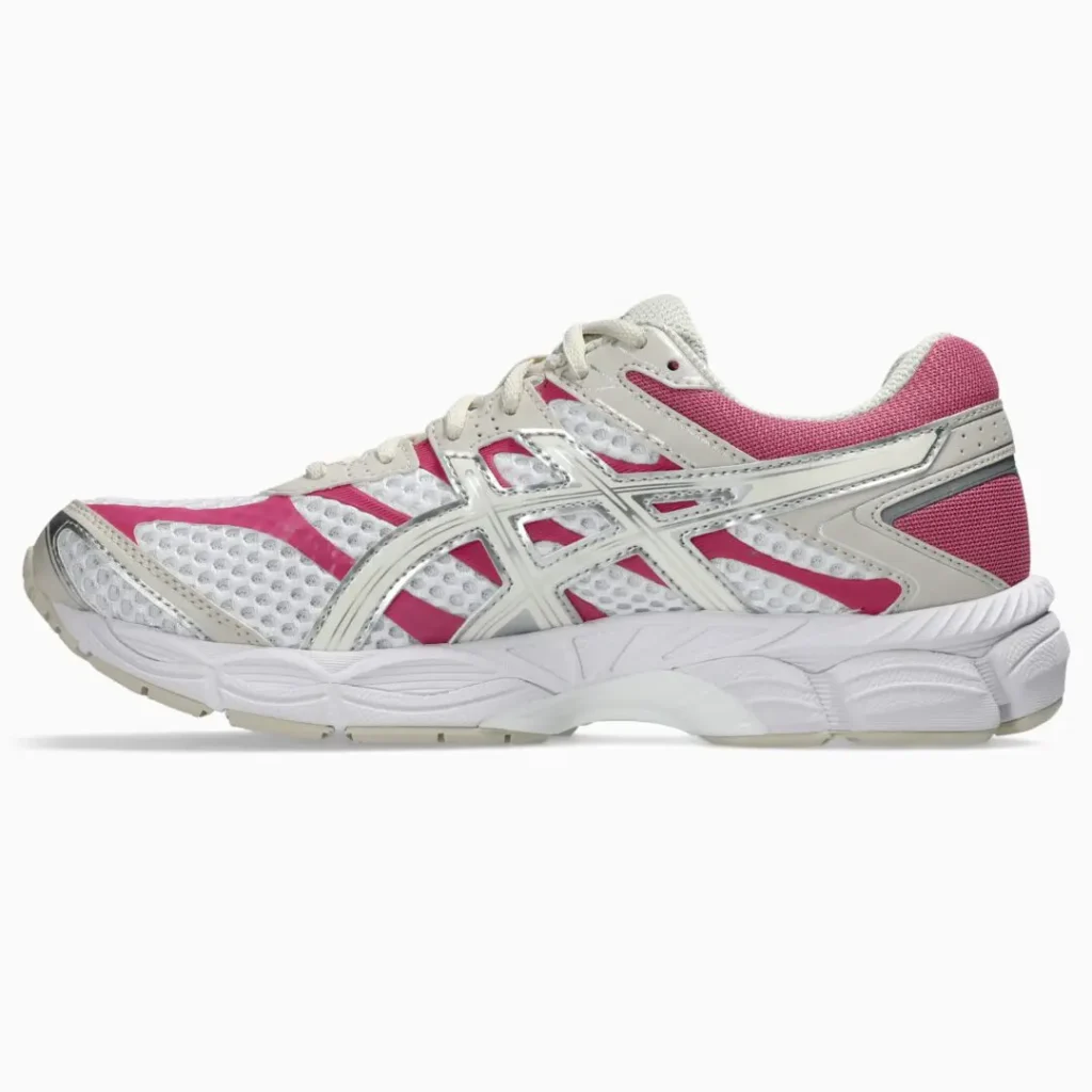Medial side product image of the ASICS GEL-CUMULUS 16 displaying the white mesh body, pink underlays, cream synthetic supports, and cushioned running platform