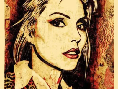 Stylized portrait artwork of a platinum-haired woman rendered in a layered street-art aesthetic, featuring bold black linework, cream skin tones, and distressed red-and-ochre textures. The subject wears a leopard-print jacket over a crisp white collar, while collage-like patterns and weathered poster details in the background evoke punk-era New York energy and propaganda-inspired visual language. The composition blends glamour, rebellion, and pop iconography through a high-contrast, screen-print-inspired treatment