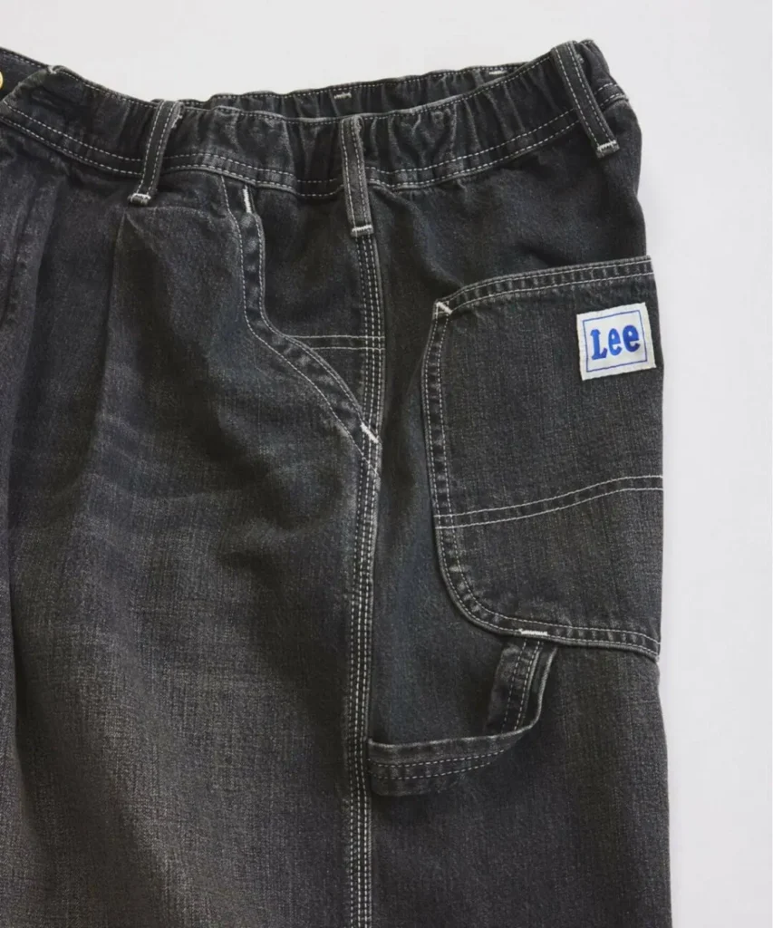 Dark indigo Buggy Painter Denim Shorts from the JOURNAL STANDARD relume x Lee collaboration featuring oversized utility pockets, reinforced stitching, and relaxed workwear-inspired proportion