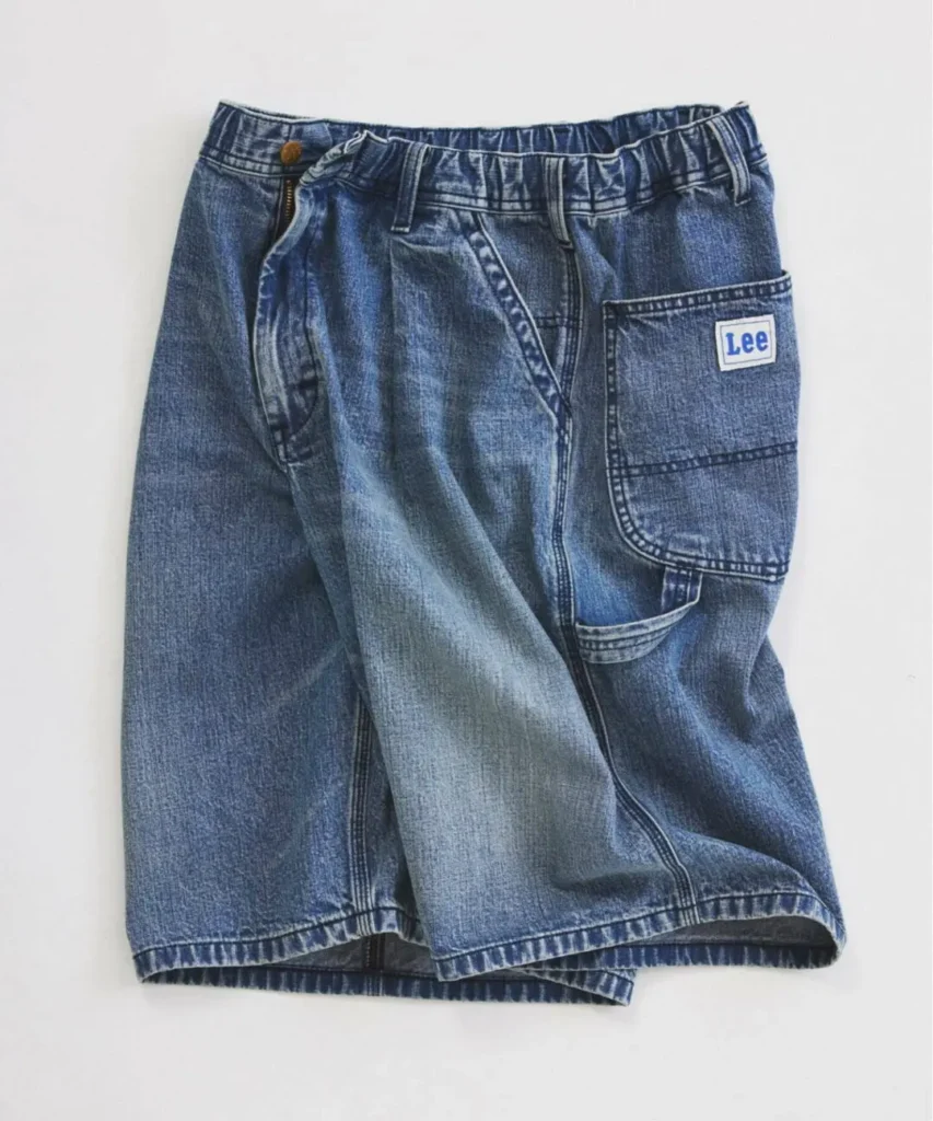 Light-wash JOURNAL STANDARD relume x Lee Buggy Painter Denim Shorts featuring a roomy baggy fit, utility pocket construction, vintage fading, and classic workwear style