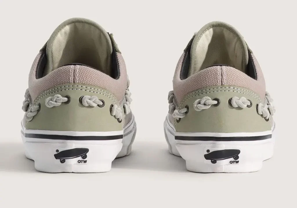 Rear view of the OTW by Vans Old Skool 36 “Knot” in the Soft Sage / Mushroom Brown colorway, highlighting the nautical rope knot detailing threaded through metal eyelets across the heel. The premium canvas and suede construction is finished with elevated foxing, a clean white vulcanized midsole, and OTW skateboard branding at the heel