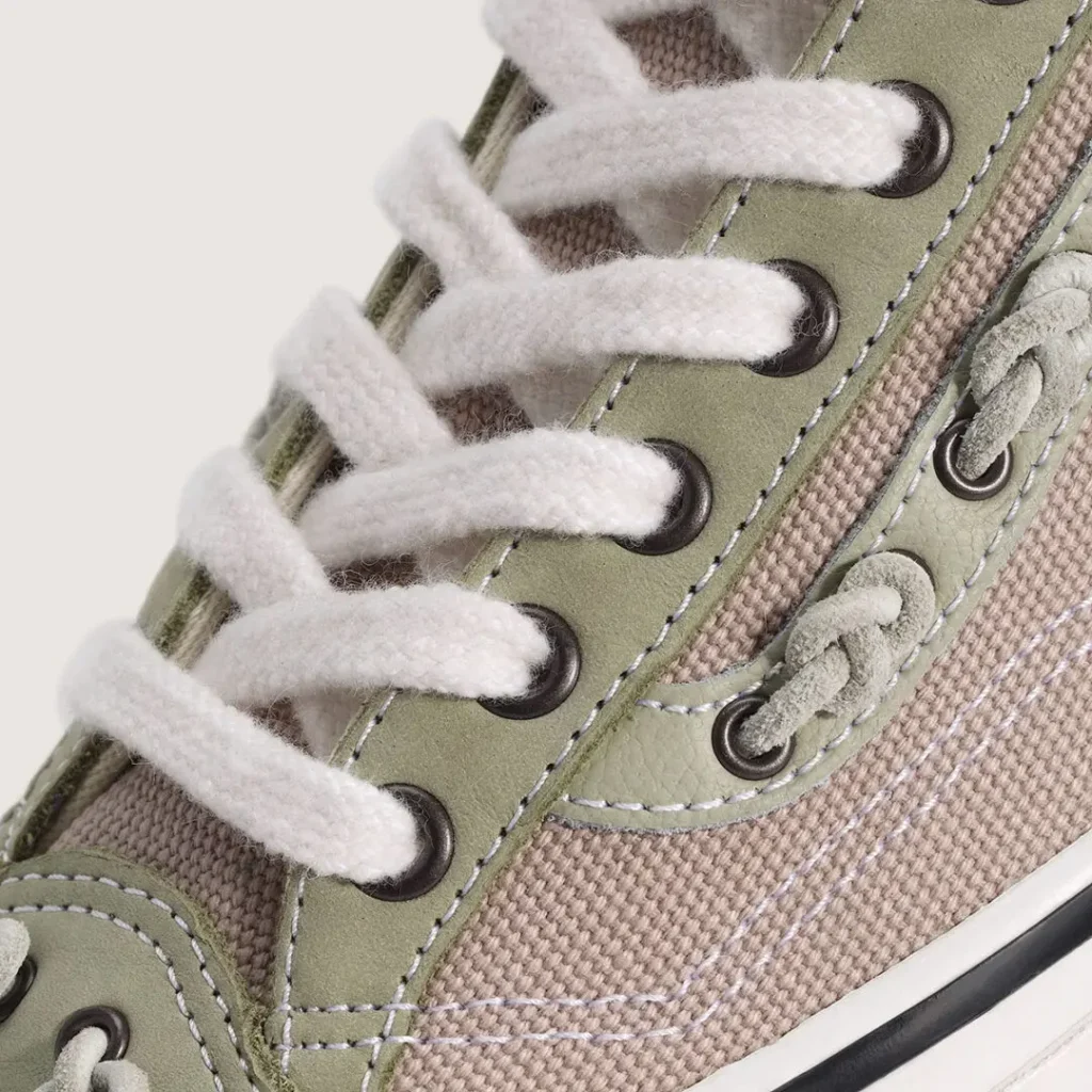 Close-up of the outsole on the OTW by Vans Old Skool 36 “Knot,” showcasing a gum-colored custom Vibram rubber sole with an angular geometric tread pattern for enhanced traction. The outsole is framed by the shoe’s white vulcanized sidewall and features the signature yellow Vibram logo at the center
