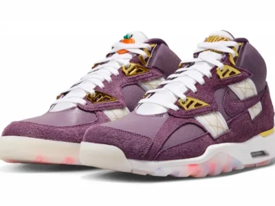 Nike Air Trainer SC “Atlanta Olympics” 30th Anniversary in Pro Purple featuring shaggy suede overlays, metallic gold hardware, white mesh panels, embroidered peach branding, and a translucent multicolor outsole inspired by the 1996 Atlanta Olympic Games