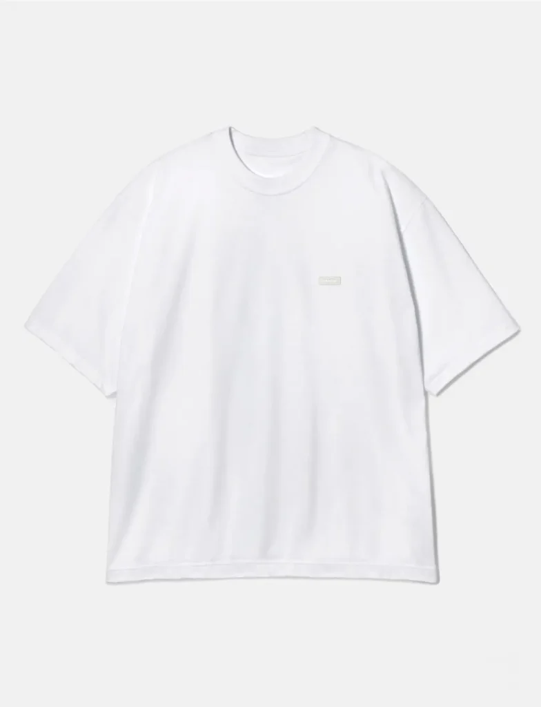 White ENNOY short-sleeve T-shirt featuring a subtle tonal logo patch on the chest and relaxed oversized silhouette