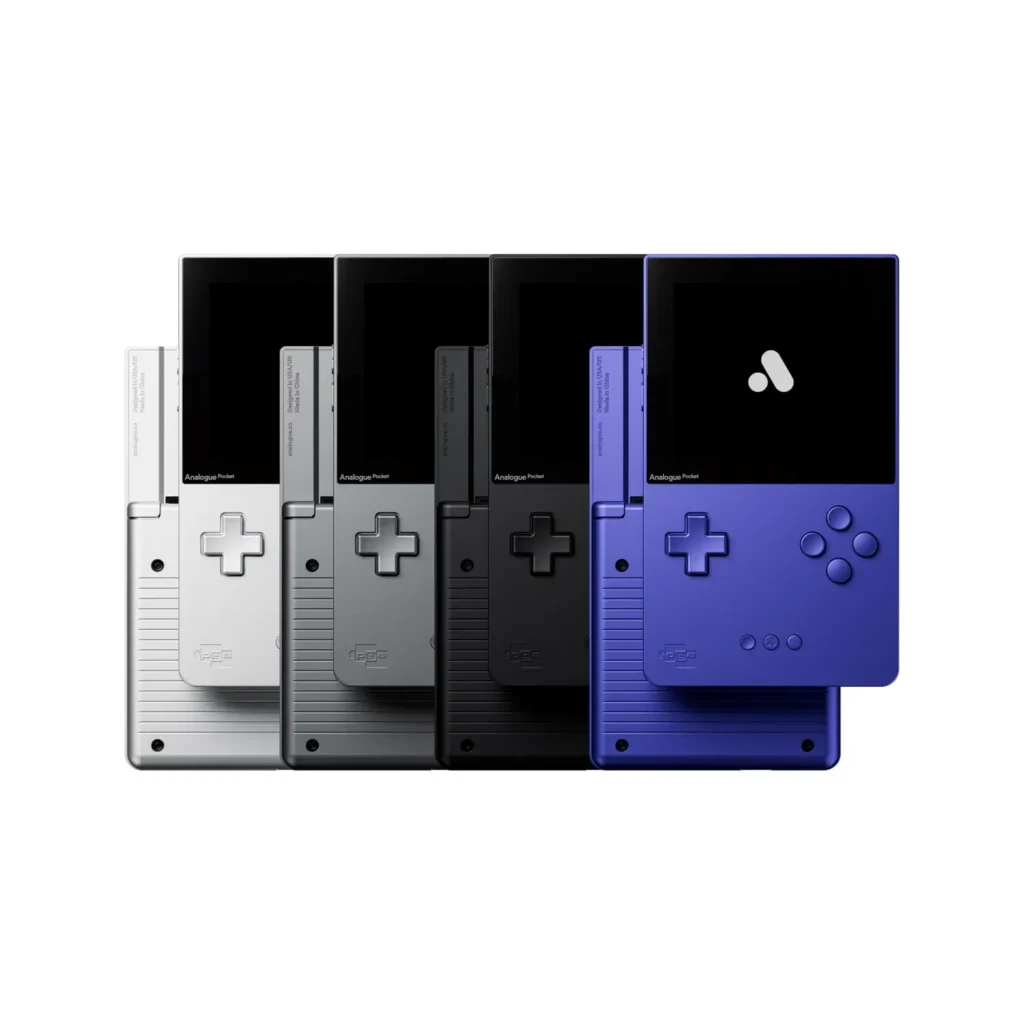 Multiple Analogue Pocket Aluminum editions displayed together in Natural silver, Noir gray, Black, and Indigo finishes, each featuring CNC-machined aluminum construction, minimalist retro-inspired controls, and stacked Game Boy cartridges, emphasizing the handheld’s collectible luxury aesthetic and FPGA-based reinterpretation of classic portable gaming hardware