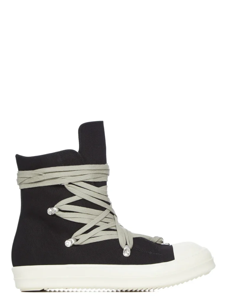Rick Owens DRKSHDW Temple Megalace® high-top sneaker in Black/Milk shown in lateral profile, featuring overdyed black denim, oversized wraparound pale laces, sculptural proportions, and an off-white rubber sole