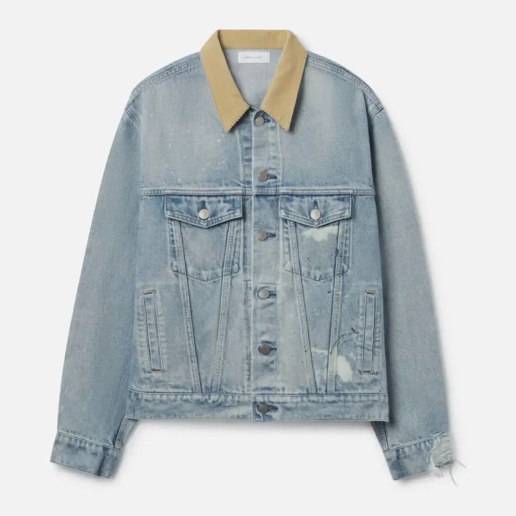 Oversized John Elliott OS Boot Stomp Type III Selvedge trucker jacket in light-washed indigo “Avalon” with tan corduroy collar, paint splatter detailing, subtle destruction, flap pockets, and redline selvedge, Made in Japan