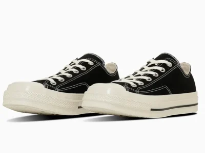 The Converse ALL STAR SQUARETOE OX reworks the classic Chuck Taylor through a sharper, dress-shoe-inspired square toe that immediately modernizes the silhouette. In black canvas with off-white rubber detailing, the sneaker balances vintage Converse DNA with a more refined, architectural stance. The angular forefoot, contrast stitching, and elevated vulcanized sole give the low-top profile a cleaner, more sophisticated presence while preserving the effortless versatility that defines the All Star legacy