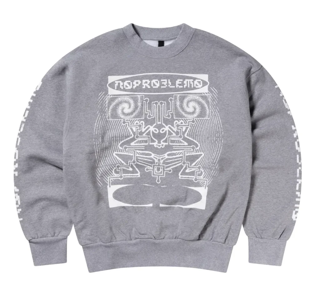 Heather gray crewneck sweatshirt featuring oversized white futuristic graphic artwork and distorted “No Problemo” branding across the chest and sleeves, presented in a clean studio product shot against a light-gray background